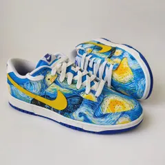 A full view of the "Starry Night" Dunks. The swirling blues and bright yellows of the original painting look so dynamic on the silhouette of a sneaker.