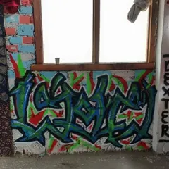 A quick wildstyle piece I did under a window in Pulga. Even in a simple room, a splash of colorful, sharp-lettered graffiti can completely change the vibe of the space.