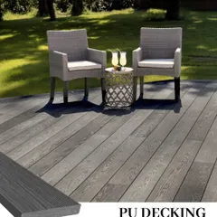 A beautiful garden deck made from grey PU decking planks. The realistic wood grain texture provides a classic look that is perfect for creating an elegant outdoor seating area.