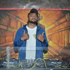 Thumbs up from the DJ booth. A signal to the crowd that the vibe is right and we're all in this together. This is authentic energy.