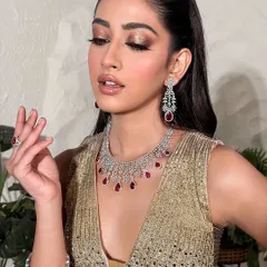 This angle highlights the shimmering eyeshadow and the glossy finish on the lips. It's a look that feels luxurious and is perfect for any evening celebration.