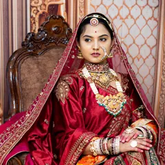 For brides who dream of a regal, majestic look, we offer styled portrait sessions. This image, inspired by royal aesthetics, showcases our ability to capture intricate details in bridal wear, jewelry, and expression, creating a timeless piece of art.
