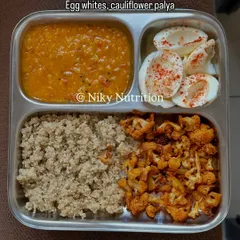 A gluten-free and eggetarian meal of quinoa, red masoor dal, boiled egg whites, and cauliflower palya.