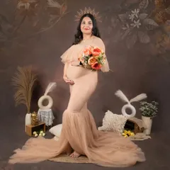 Adding a bouquet of flowers brings a touch of fresh color to the earthy tones of this boho setup. This shot shows how we can personalize the session with different props to match your style.