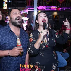 It's all about moments like this. Two people, lost in the song, giving it their all. My karaoke nights are a judgment-free zone for both bathroom singers and stage pros.