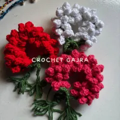 A close-up of my crochet gajras, available in classic white, vibrant red, and pretty pink. Each one is handcrafted to look like a real mogra gajra but lasts forever.