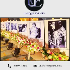 A unique "Memory Lane" concept we created for a client. We displayed cherished family photos along a walkway, illuminated by spotlights and accented with flowers, adding a deeply personal and emotional touch to the event.
