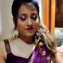 A bold and beautiful party look. This client wanted something dramatic, so we went with a purple smokey eye, a deep berry lip, and a voluminous side-swept hairstyle.