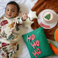 Celebrating your baby's milestones is so important, and I love creating special setups to mark the occasion. This was for a "3/4th year" celebration, combining a festive theme with props that highlight this unique stage in a baby's first year.