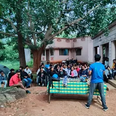 An evening briefing session at our Ramanagara campsite. These moments are for sharing stories, learning new skills, and building a strong sense of community among the students.
