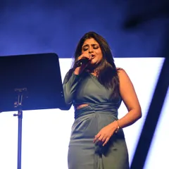 Lost in the song during a live performance. These moments on stage, under the lights, are what I live for.