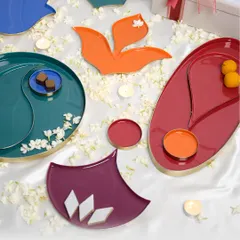 Our Symbols of Celebration are here. This flat lay showcases the entire collection of colorful, symbolic trays and plates, perfect for making the moments you cherish even more beautiful.