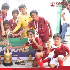 The future of football is bright at our academy. Here, our joyful U-9 and U-11 champions celebrate with their medals and the DUSF Grassroots Football Fiesta trophy, showcasing the success of our youth development programs.