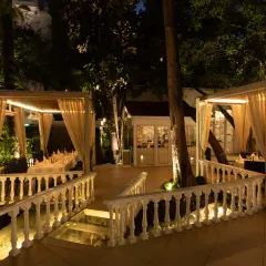 The view from our terrace at night, showing the layout of our romantic cabanas. The space is designed with multiple levels and pathways to create a sense of discovery and privacy.