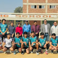 Our boys' team standing together with coaches and officials. This photo represents the discipline and unity we foster within our academy.