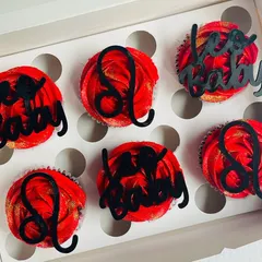 A full view of the six-piece Leo baby cupcake box, showing the alternating designs of the zodiac sign and the "Leo Baby" text.