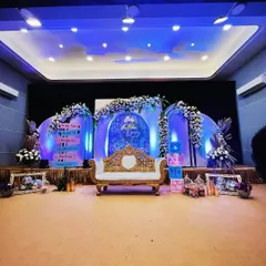 A full stage view of a "Twinkle Twinkle Little Star" themed baby shower. The design includes multiple decorated panels, a regal white and gold throne for the mom-to-be, and sparkling disco balls to catch the dreamy blue and purple lighting.