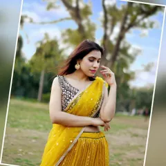 A wider shot from the same outdoor session, showing more of the park setting. The tilted frame adds a dynamic, editorial feel to this fashion portrait.