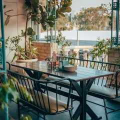 One of my favorite spots is this outdoor patio. It’s a space to enjoy Bangalore's pleasant weather, surrounded by greenery, making it a refreshing setting for casual get-togethers or a breakout area during corporate events.