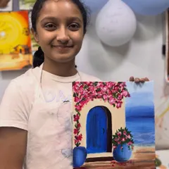 Another happy student from our Valentine's week workshop. Her canvas painting captures the bright, sunny feel of a seaside escape, showcasing her impressive skills.