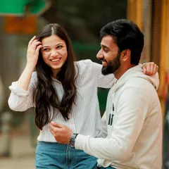 Capturing a moment of genuine laughter during a candid pre-wedding shoot. We focus on creating a relaxed atmosphere where you can forget the camera and just enjoy each other's company.