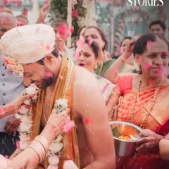 The groom surrounded by family and a shower of pink petals. We get right into the action to capture the energy and emotion of the celebration.