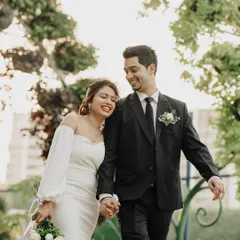 The pure joy after saying "I do." Charlene and Dexter's happy, relaxed walk through the Dubai Butterfly Garden after their elopement is a perfect picture of newlywed bliss.