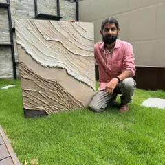 For modern homes, I create textured abstract paintings like this one. Using a palette knife, I build layers to give the canvas a unique 3D feel that plays with light and shadow, adding a contemporary touch to any wall.