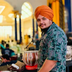 A candid portrait with my tabla. This image reflects my personal connection to music and my identity as a tabla player.