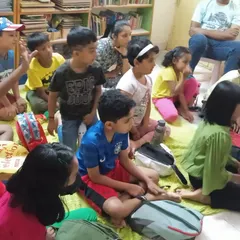 A room full of curious minds. The kids are seated and listening intently, ready for the next instruction at one of my popular science camps.