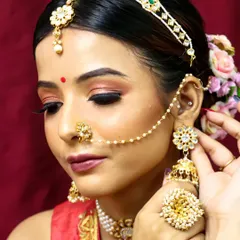 Another angle of this simple yet stunning bridal look. The focus is on clean skin and softly defined eyes.