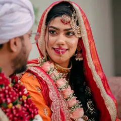 A candid glance between the bride and groom during their Nikah ceremony. I focus on capturing these unscripted, heartfelt interactions that tell the true story of your day.