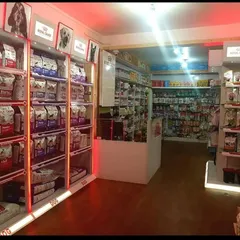Our store is lit to showcase the incredible variety of products we offer. This shot highlights our main dog food aisle, packed with options for every breed.