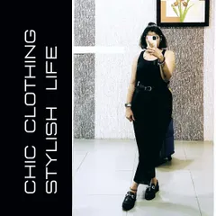 An all-black outfit is the epitome of chic. Here, a simple black jumpsuit or two-piece set is elevated with a statement belt and chunky loafers, creating a stylish, monochromatic look that works for any season.