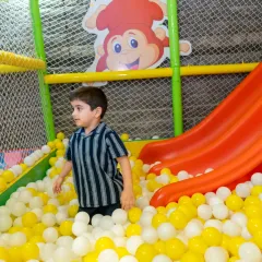 Our indoor play zone, complete with a vibrant ball pit and slide, is a paradise for little explorers. It's a safe and fun environment where children can develop their physical skills and make new friends during playdates.