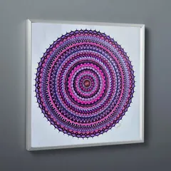This large 2x2 feet 'Magenta State of Mind' mandala is shown in a simple white frame. The intricate layers of magenta and purple create a mesmerizing effect that draws you into the center.