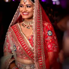 The pure, uninhibited smile of a happy bride. Our goal is to make you feel comfortable and confident, which allows us to capture genuine expressions of joy like this one.