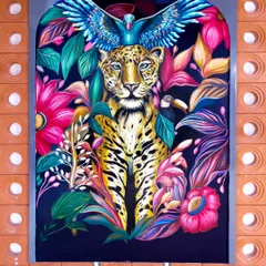 A powerful leopard mural, also painted for the Uttarakhand project. Surrounded by vibrant, tropical foliage, this piece brings the untamed spirit of the wild indoors.