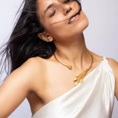 An expressive shot featuring a unique leaf-motif choker, demonstrating how to create a mood that complements the jewellery's design.