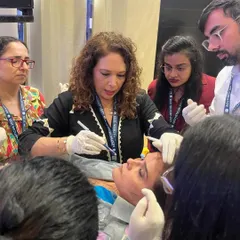 Hands-on experience is crucial in aesthetic medicine. Here I am conducting a live demonstration on Mono & Cog Threads at Aestheticon 2025, sharing advanced techniques with fellow doctors.