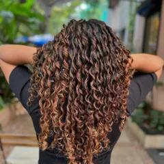 Letting these gorgeous curls live their best life. I gave them a fresh cut and a non-bleach color to define the pattern and add dimension. Look at that bounce. (No filter)