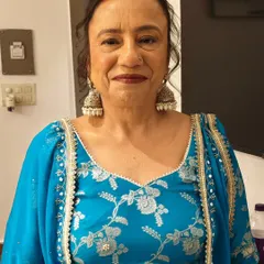 A smiling shot of my client. The makeup is subtle and fresh, giving her a youthful glow without looking heavy.