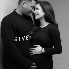 A classic black and white couple's portrait. The simplicity of monochrome enhances the emotion and connection, creating a timeless image of your love story.
