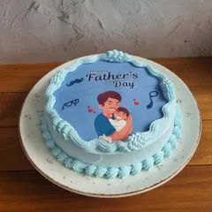 Show Dad he's your hero with a personalized Father's Day cake. This design features a sweet illustration of a father and child, making it a heartfelt gift.