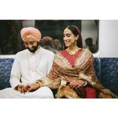 Shaan and Shubham share a quiet moment on the London Tube after their wedding. It’s a real, unscripted adventure that beautifully tells the story of their modern love.