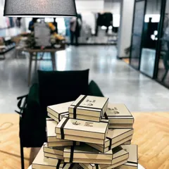 A stack of our bespoke dessert boxes ready for a Bombay Shirt Company event. We handle corporate orders of all sizes, ensuring each gift is perfectly presented and delivered on time.