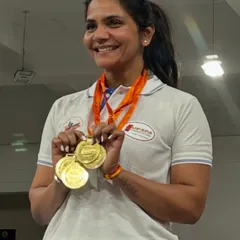 Holding my gold medals from the UP States Classic Powerlifting Championship. This is a reminder that with the right coaching and a promise to yourself, you can achieve your goals.