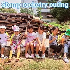 A group of young rocketeers takes a break during our stomp rocketry outing. They built their launchers and rockets from scratch.