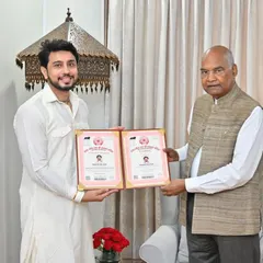 A cherished moment as I receive the Bharat Gaurav Ratna from the former President of India, Shri Ram Nath Kovind. This recognition is a blessing from my Thakur Ji and a testament to my art.