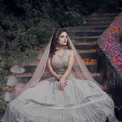 The full look of the grey lehenga, perfect for creating a dramatic and romantic vibe. The flowing skirt and delicate dupatta are made for beautiful pictures.